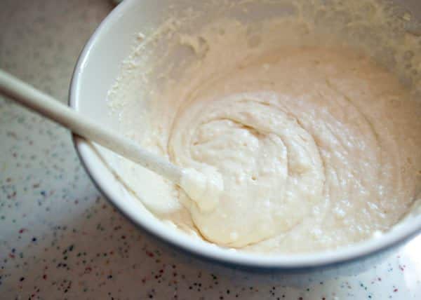 mixed ingredients for buttermilk pancakes in a mixing bowl