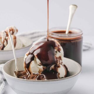 best chocolate sauce being drizzled over a bowl of ice cream