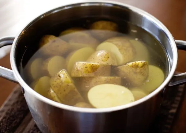 potatoes in water and salt in a pot