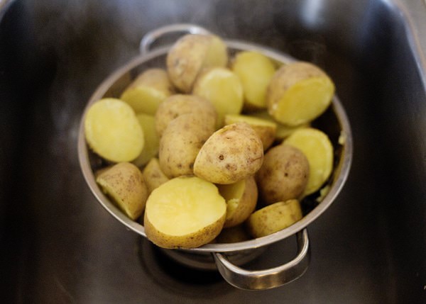 potatoes draining in colander