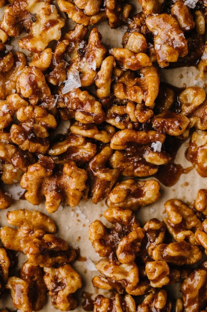 slow cooker sweet and spicy nuts on a plate