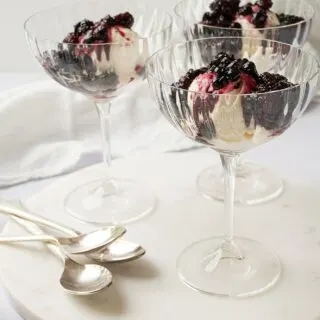 bowls of roasted summer berries over ice cream