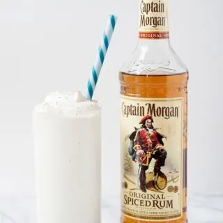 spiced coconut rum shake in a glass with Captain Morgan