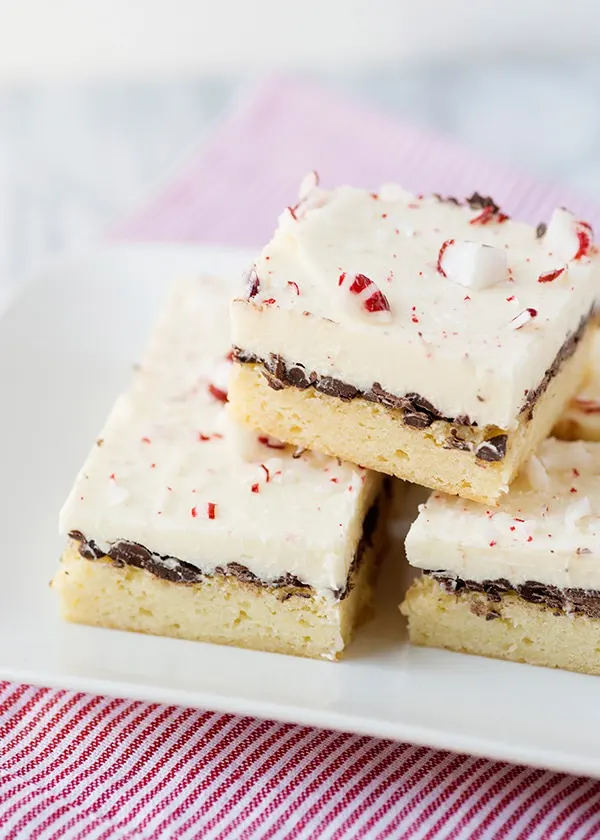 Three peppermint white chocolate bars on a white plate