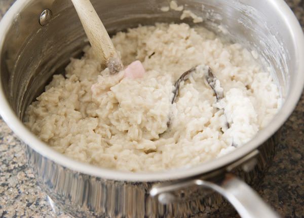 thick and creamy risotto in saucepan
