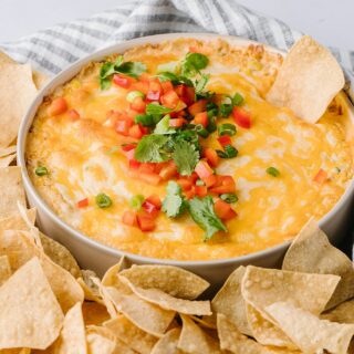 bowl of hot corn dip with corn chips