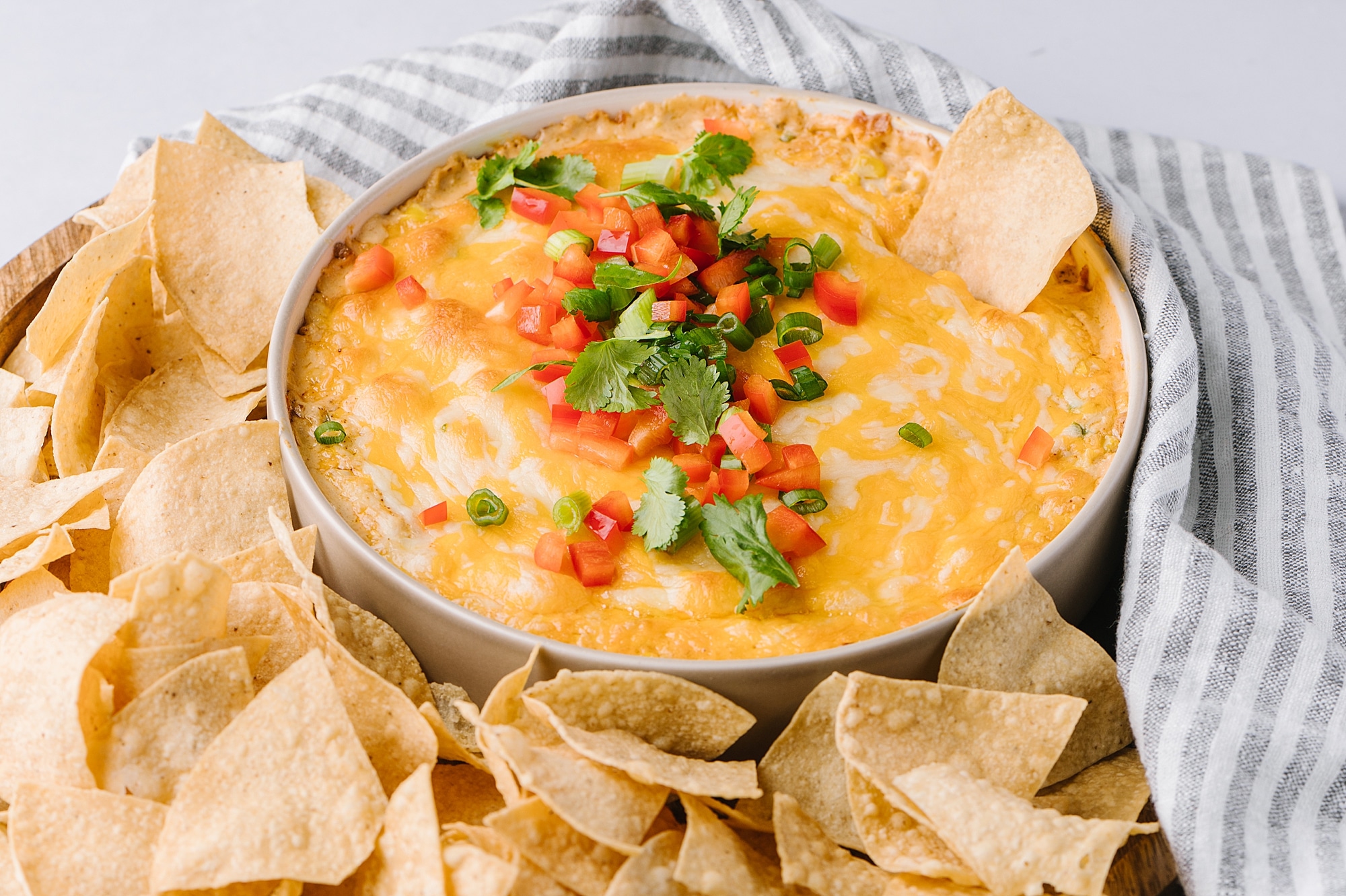 bowl of hot corn dip with corn chips