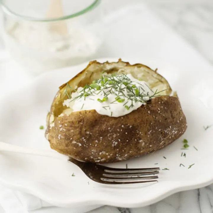 Baked Potatoes with Garlic Herb Sour Cream