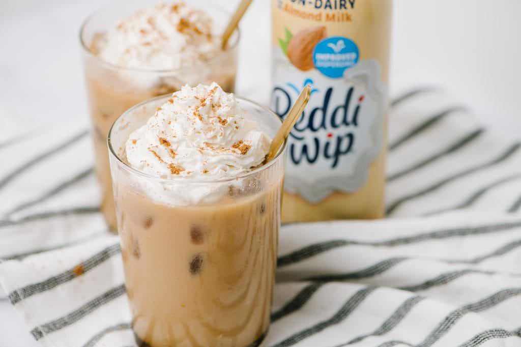 iced coffee with almond whipped cream