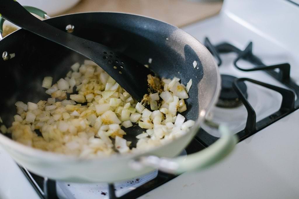 onions and garlic frying in pan
