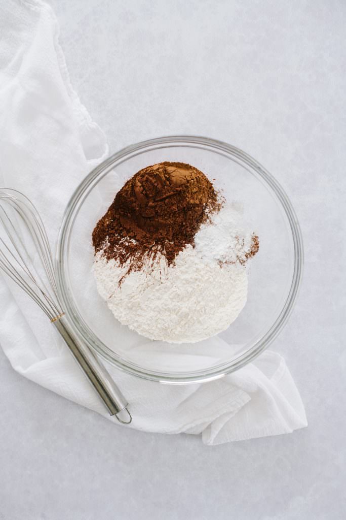 flour, cocoa powder and salt in clear mixing bowl