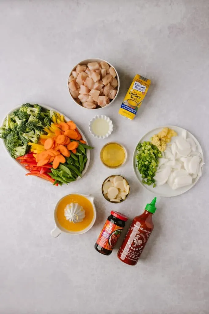 ingredients for healthier orange chicken and vegetables