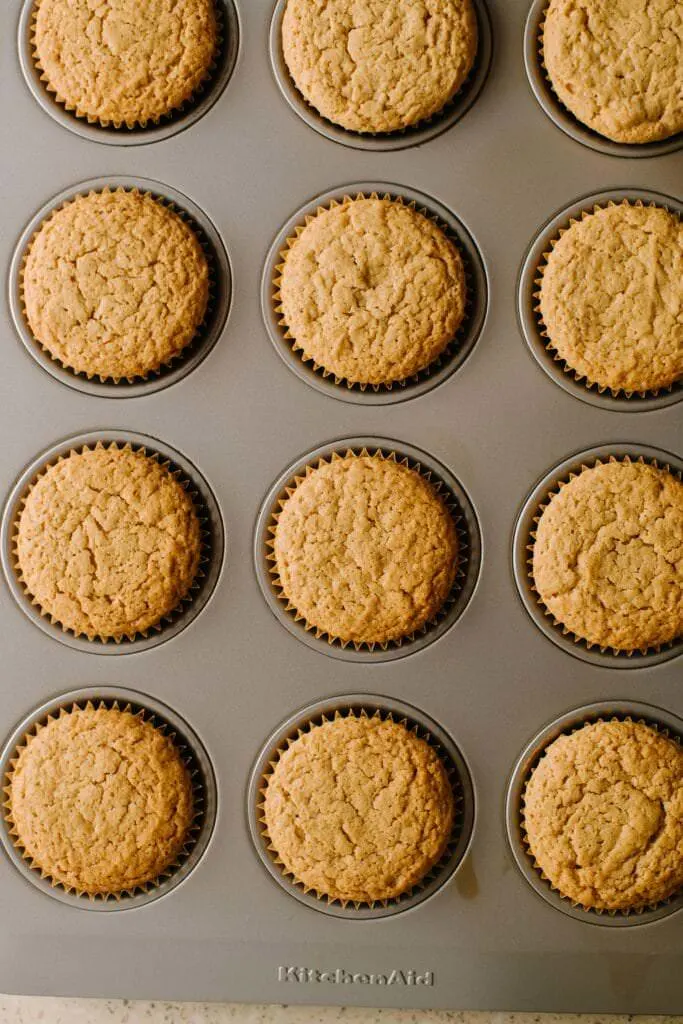 baked biscoff cupcakes in cupcake tin