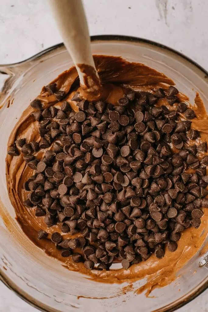 chocolate kahlua cake batter and chocolate chips in glass bowl