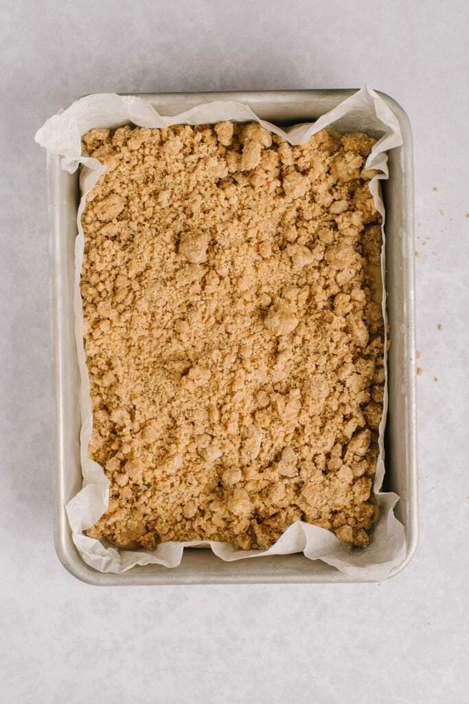baked new york crumb cake in a 9x13 pan