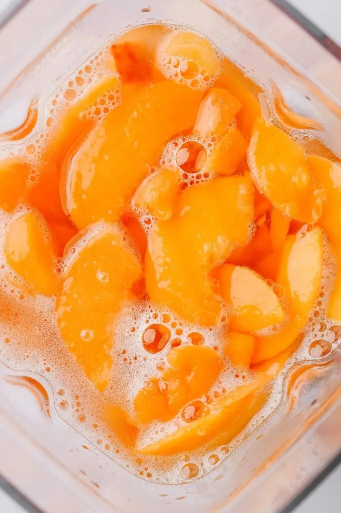 peaches and champagne in a blender