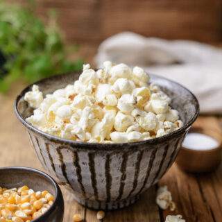 Stovetop Popcorn in a bowl shot from the side