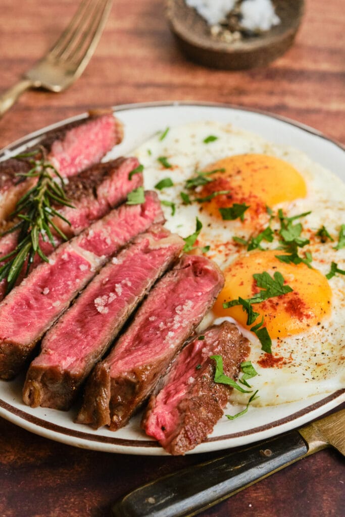 Steak and Eggs Recipe featured image close up view